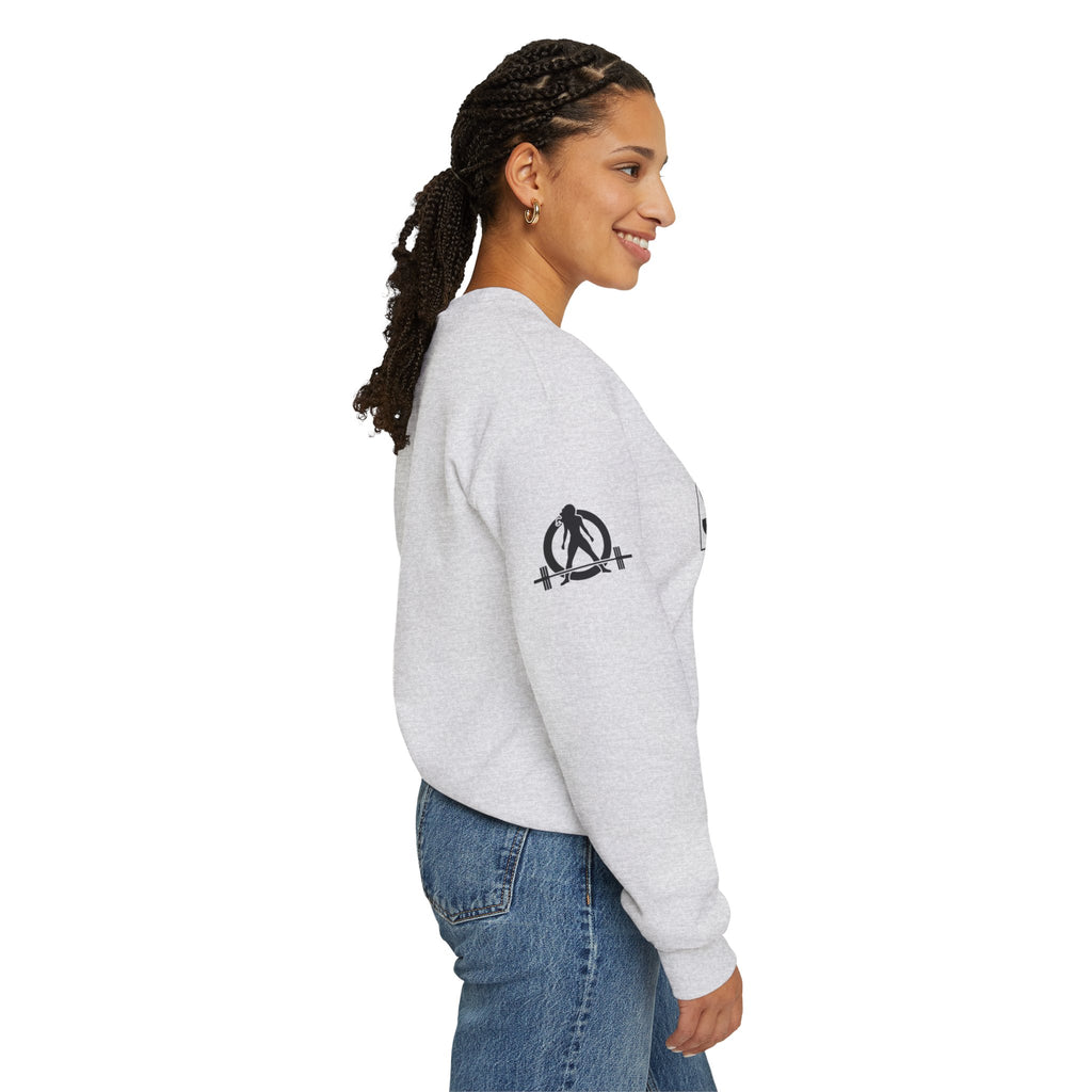 She is STRONG - Unisex Heavy Blend™ Crewneck Sweatshirt - Front Black Logo - Plain Back