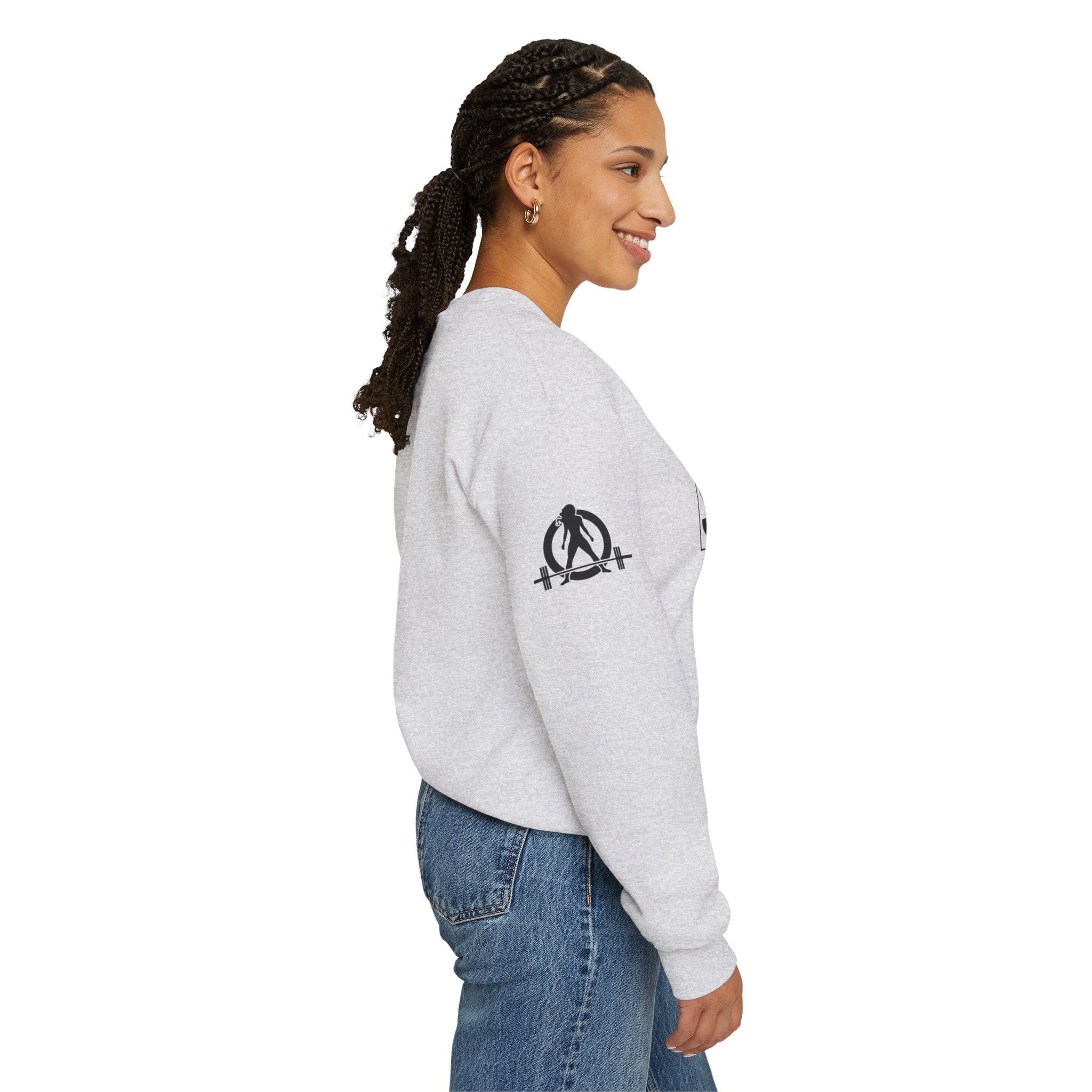 She is STRONG - Unisex Heavy Blend™ Crewneck Sweatshirt - Front Black Logo - Plain Back