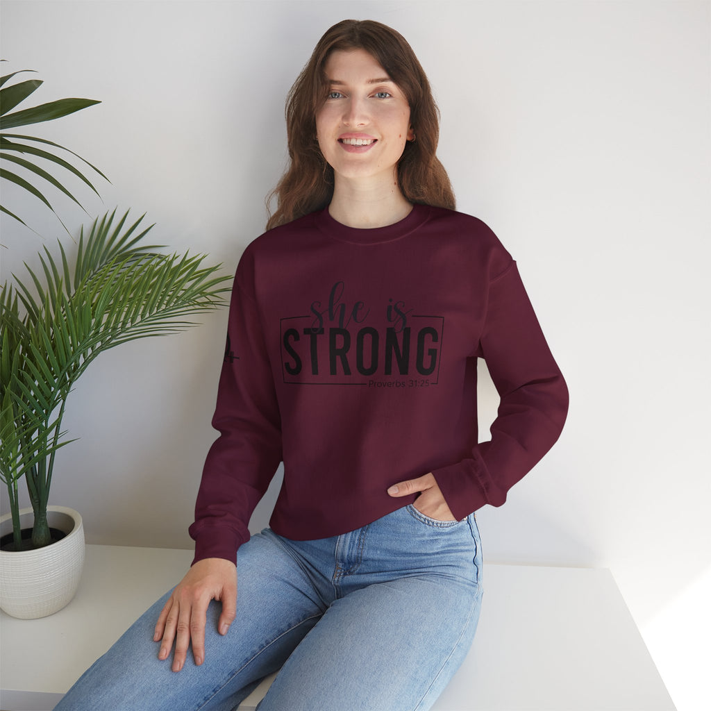 She is STRONG - Unisex Heavy Blend™ Crewneck Sweatshirt - Front Black Logo - Plain Back