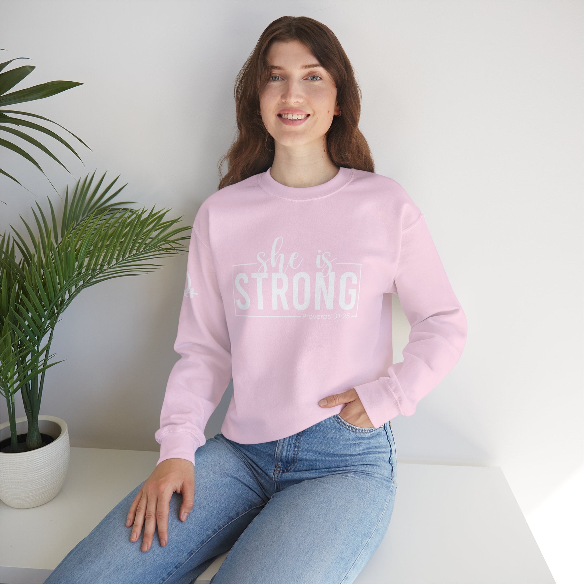 She is STRONG - Unisex Heavy Blend™ Crewneck Sweatshirt - Front White Logo - Plain Back