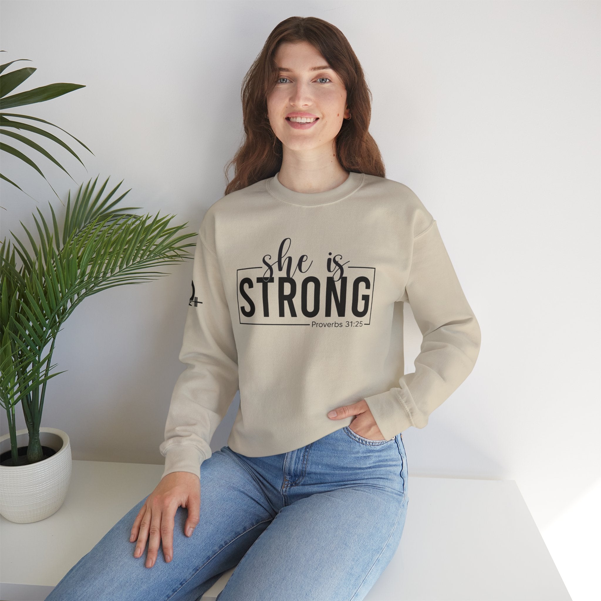 She is STRONG - Unisex Heavy Blend™ Crewneck Sweatshirt - Front Black Logo - Plain Back