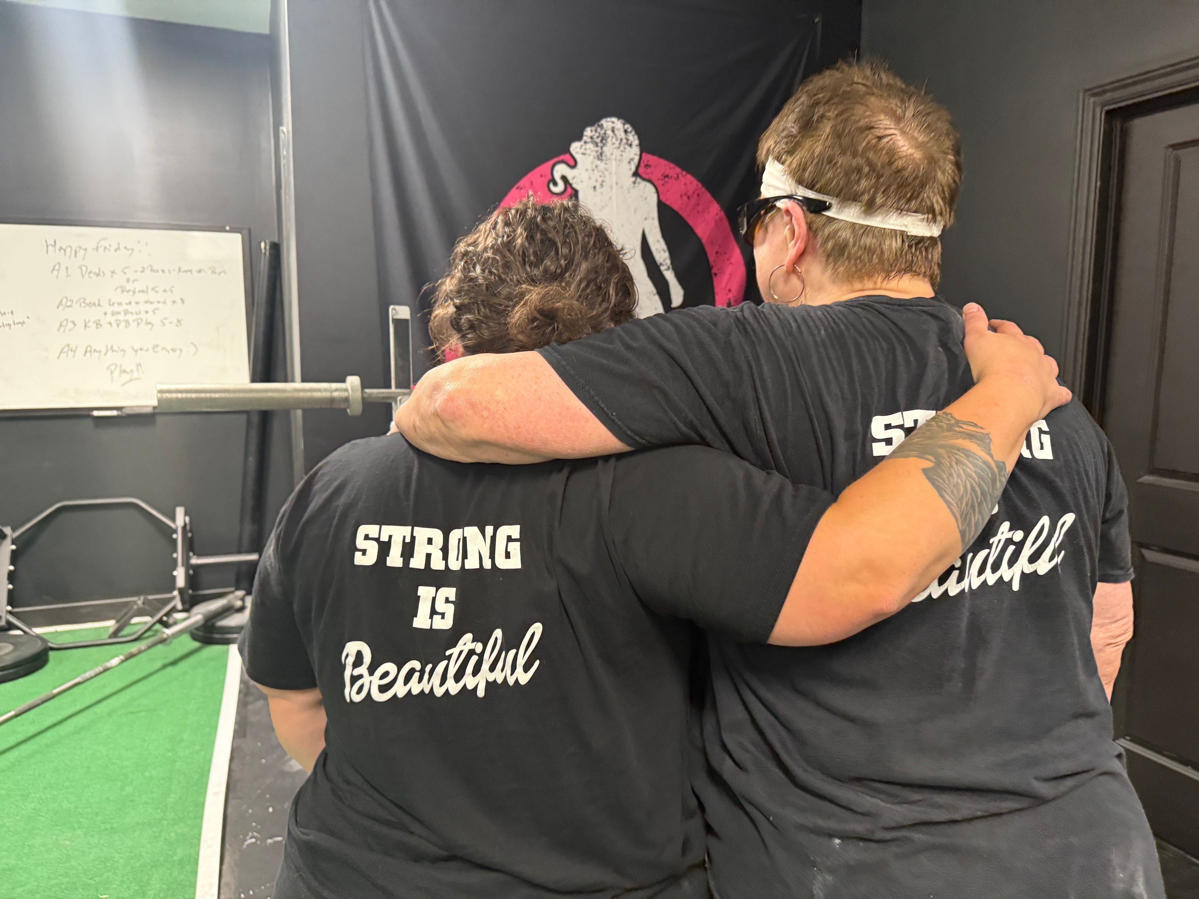 Strong Is Beautiful  - Unisex Softstyle T-Shirt - White Print on on back.