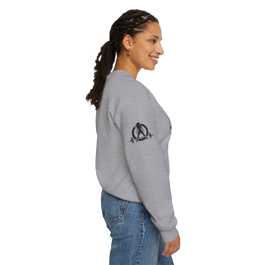 She is STRONG - Unisex Heavy Blend™ Crewneck Sweatshirt - Front Black Logo - Plain Back