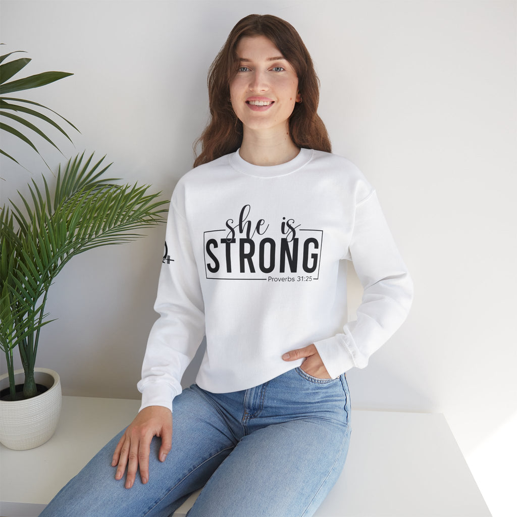 She is STRONG - Unisex Heavy Blend™ Crewneck Sweatshirt - Front Black Logo - Plain Back