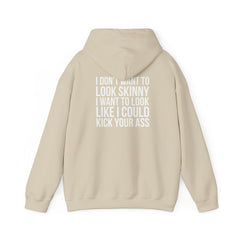 I DON’T WANT TO LOOK SKINNY, I WANT TO LOOK LIKE I CAN KICK YOUR ASS – Unisex Heavy Blend™ Hooded Sweatshirt (White Logo) 🤍