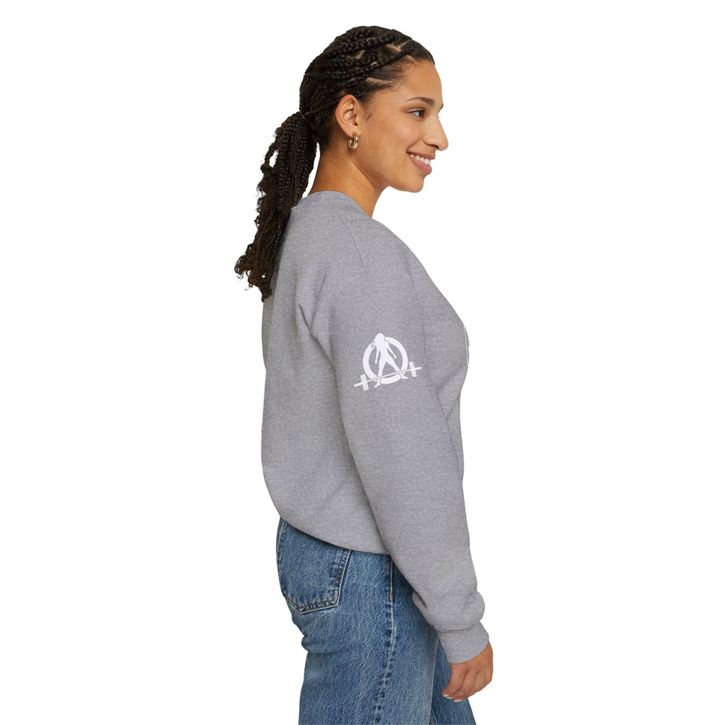 She is STRONG - Unisex Heavy Blend™ Crewneck Sweatshirt - Front White Logo - Plain Back
