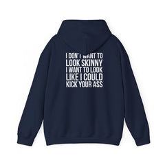 I DON’T WANT TO LOOK SKINNY, I WANT TO LOOK LIKE I CAN KICK YOUR ASS – Unisex Heavy Blend™ Hooded Sweatshirt (White Logo) 🤍