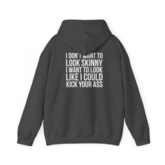 I DON’T WANT TO LOOK SKINNY, I WANT TO LOOK LIKE I CAN KICK YOUR ASS – Unisex Heavy Blend™ Hooded Sweatshirt (White Logo) 🤍
