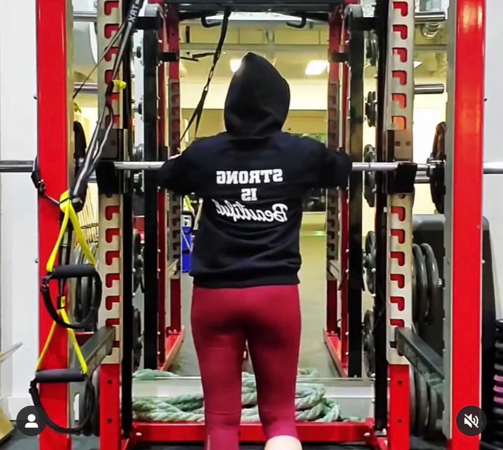 Strong Is Beautiful – Unisex Heavy Blend™ Hooded Sweatshirt (Distressed White Logo) 🤍💪